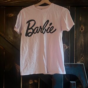 I’m selling a light pink Barbie t-shirt.